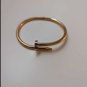Elegant Gold Nail Bracelet